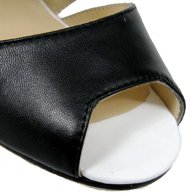 Manolo Blahnik black and white back slide fastener pumps